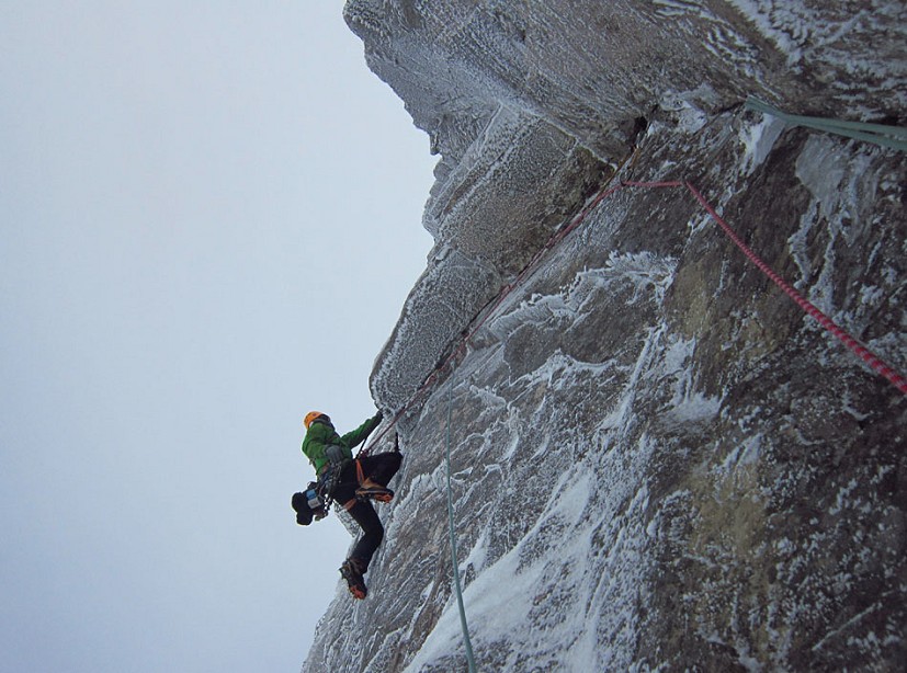 Murdoch pulling over the roof with just the crux of Hydroponicum to go on the FWA of The Route of All Evil, Beinn Eighe  © John Orr