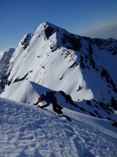 Tom descending Sgurr a Ghreadaidh on firm snow, as part of a one day winter traverse.  © ian stewart