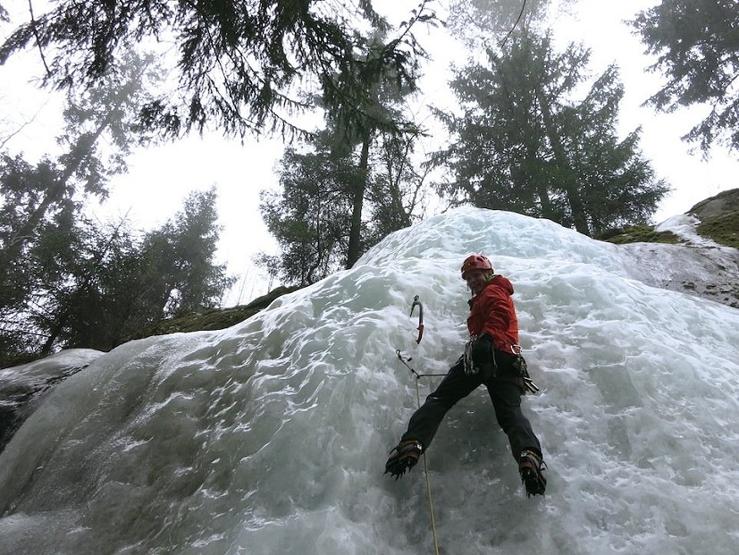 Ice climbing on a soggy day in the Alpha Comp Hoody  © Toby Archer