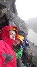 Hunkering down out if the hail on the third belay ledge of Morpheus