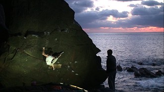 Tom in the middle of the crux of Wonderland, 8A, Priest's Cove, Cornwall  © Tom Bunn