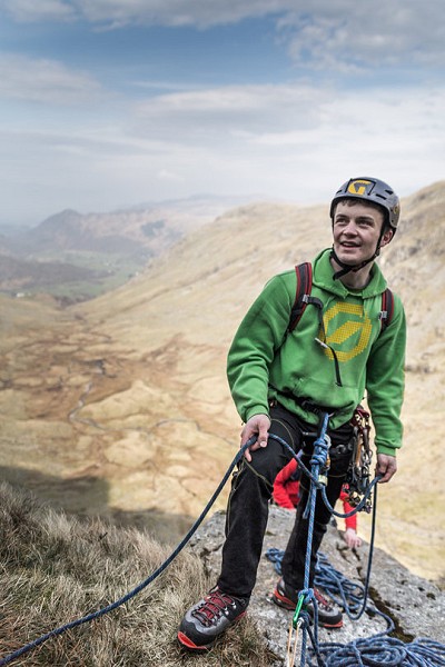 Matthew belays as Jamie leads the final pitch of Corvus. Not a bad view of the valley!  © Joel Stephenson