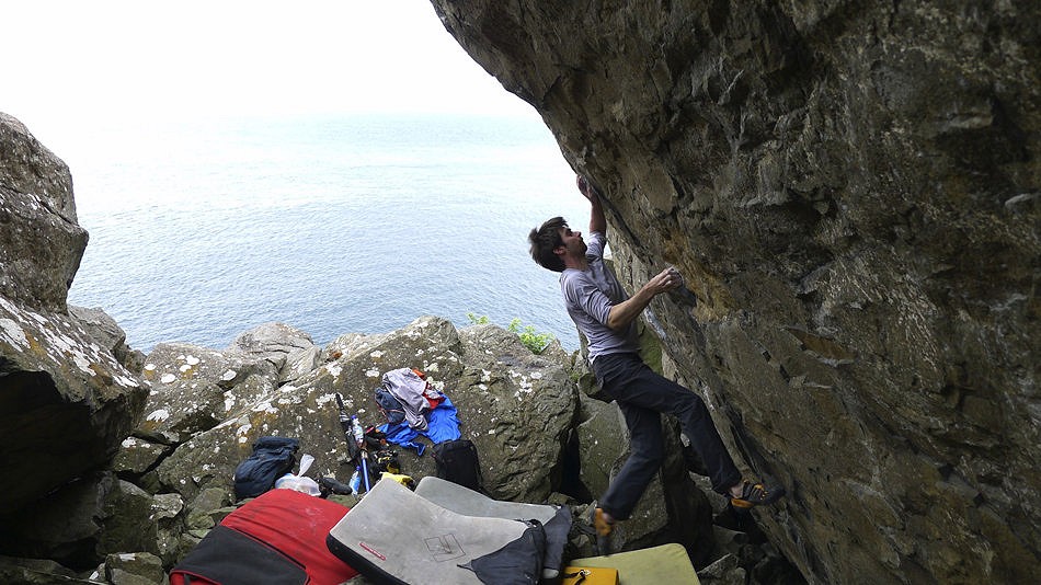 Dan on the first ascent of Game of Bones, 8A+, Fairhead  © Katie Mundy