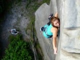 Emma climbing Advertisement Wall at High Rocks