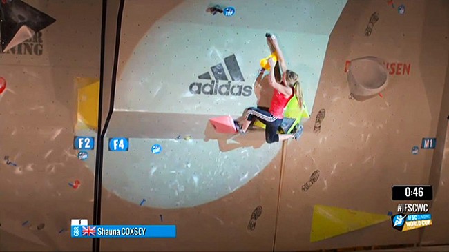Shauna Coxsey about to make the final move to finish problem 4 and win a gold medal  © IFSC (Screenshot from video)