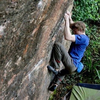 Ellis making the FA of Triple Trouble, an 8A link-up at Churlston Cove  © Charlotte Warner