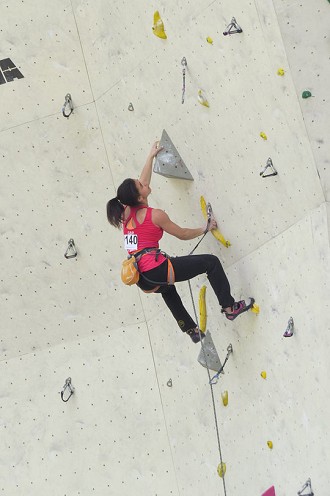 Molly climbing to first place during the Imst Eurpoean Youth Cup, 2014  © Tanya Falling