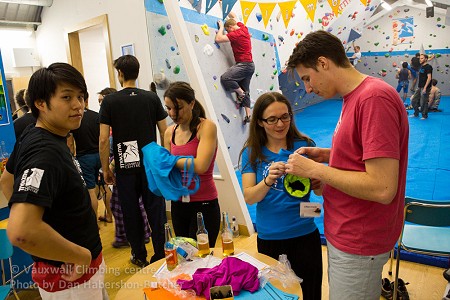 Climbers trying on their prizes  © VauxWall