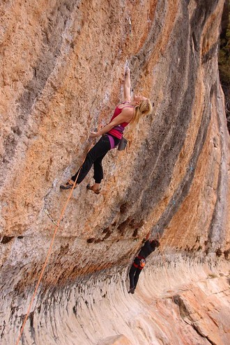 Leah Crane at full stretch on Anabolica, 8a, Siurana  © Casa Catalunya