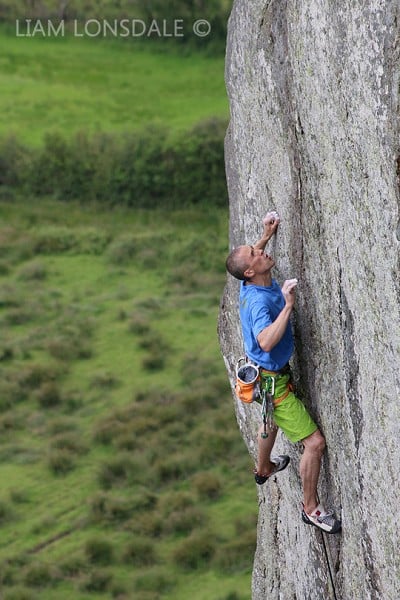 Steve McClure going for it on the top section of Strawberries, E7 6b, Tremadog  © Liam Lonsdale