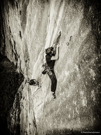 Alex Megos climbing one of the hard technical pitches on Fly, 550m 8c  © Frank Kretschmann