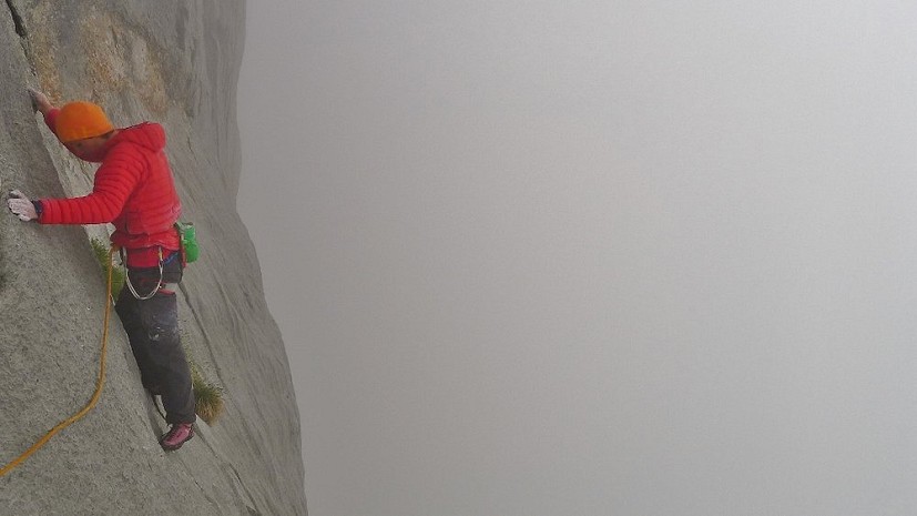 Wiz battling cold and damp on the 7a+ pitch of Silbergeier  © Calum Muskett