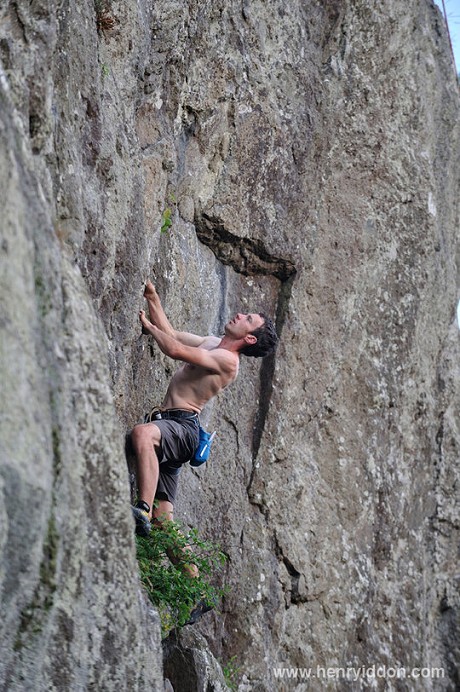 Caff on Harlot's Face E1 5b, Castle Rock, on his way to soloing 100 Lake District Extremes  © Henry Iddon