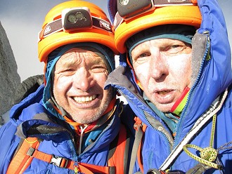 High-point selfie: the strain and disappointment of deciding to descend so close to success.  © Simon Yearsley