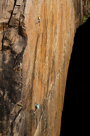 John McCune high on the perfect granite of the upper wall of The Second Coming (E7 6b).   © Craig Hiller