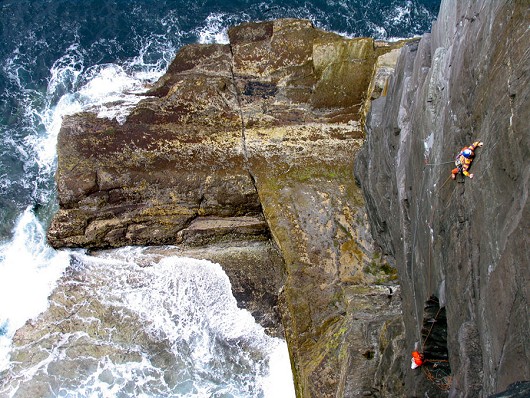 John McCune on a rare ascent of Kerry Gold E4 5c, Valentia Island, Co. Kerry, Ireland.  © dlyonsewing