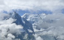 Aiguille du Midi, Tacul, Maudit and Mont Blanc appearing in a break in the clouds