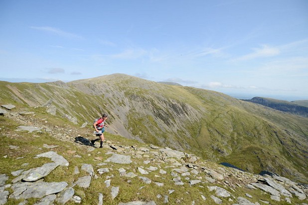 Wendy Dodds, at 61 the oldest competitor to complete the 2012 race, begins the descent off Pen yr Ole Wen   © Jon Brooke