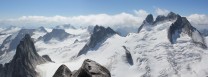 Looking west from Bugaboo Spire Summit towards Pigeon Spire & Howser Towers
