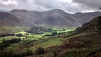 Sunlight on a brooding day in Langdale