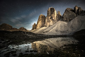 The Tre Cime di Lavaredo bathed in moonlight  © James Rushforth