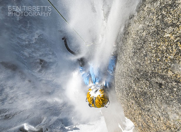 Victor Saunders under the influence of spindrift on the Migot Spur...  © Ben Tibbetts