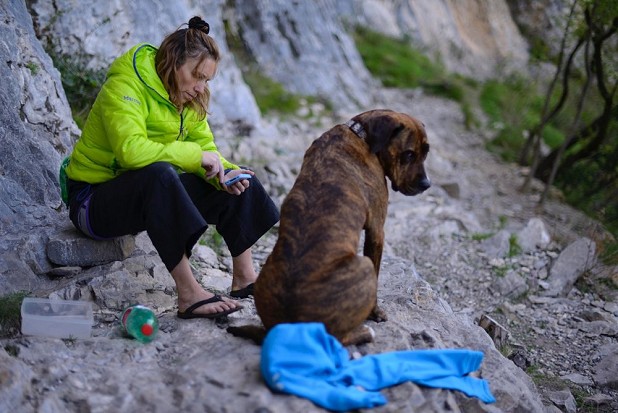 Lucy with one of her dogs, Buis, in Val Pennavaire, Italy  © Tim Glasby