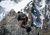 Demonstration of à cheval climbing Pyramide du Tacul summit 1965