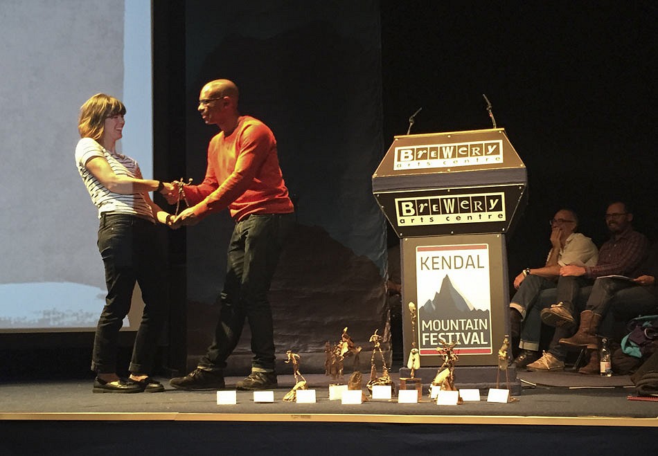 Jen Randall, winner of the Best Short Film, receiving her award from Keme Nzerem, the Chair of the KMF Jury  © Alan James