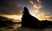 Natalie Berry bouldering at White Beach on the Isle of Man.<br>© Chris Prescott