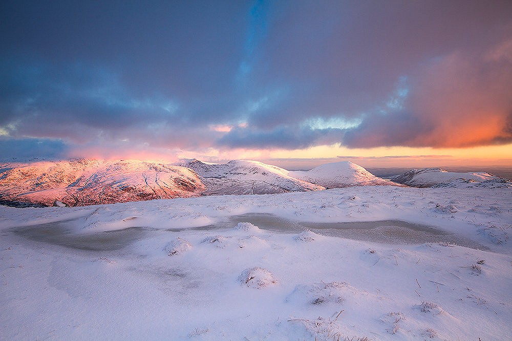Looking over to the Carneddau from Y Foel Goch at sunrise  © Chris Miles