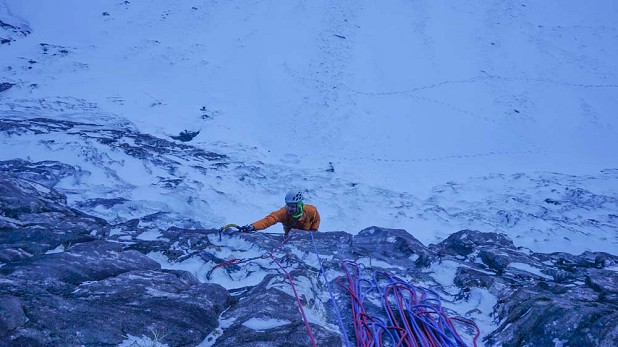 Guy pulling over the roof on the crux pitch  © Guy Robertson
