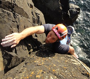 Event Organiser Alex Haslehurst taking some time out on the Cornish classic: Behemoth (E2) at Guernards Head  © Rob Greenwood - UKC