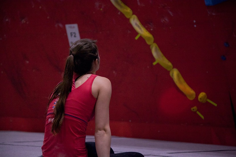 Tara Hayes, like many others, finding the standard of problems hard throughout the Semi-Finals  © Rob Greenwood - UKC