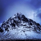 Buachaille Etive Mor in the snow looking towards the classic route Curved Ridge and other great climbs.
