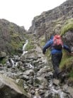 Scrambling up the boulder filled gully to Foxes Tarn