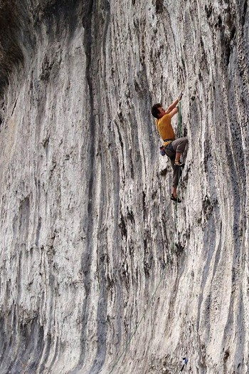 Rob Greenwood crimping his way to glory on Toadal Recall (8a) at Malham Cove  © Penelope Orr