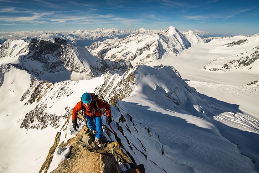 Stuart Johnston on the airy Gross Grunhorn summit ridge  © Ben Tibbetts