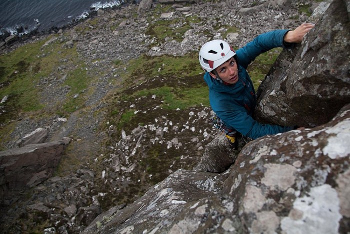 Henry Francis at the top of Jolly Roger (E3 6a), with the 1000 yard stare after 50m of climbing in high wind  © Rob Greenwood - UKClimbing