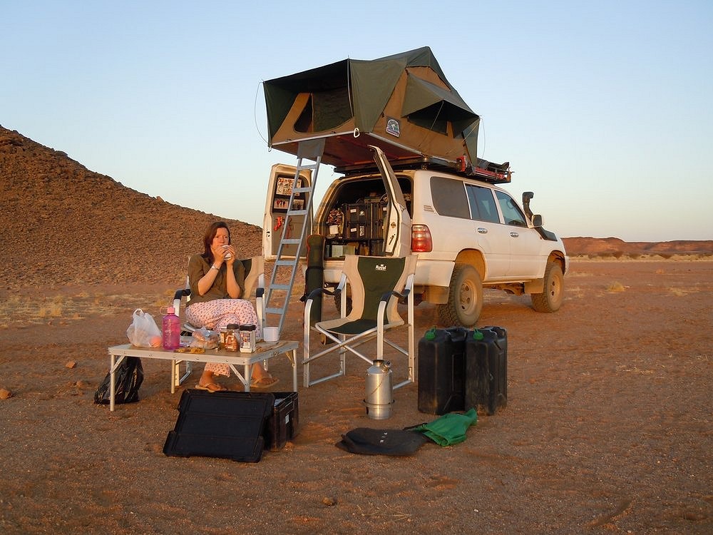 Relaxing with Brenda and her rooftop tent  © Nick Fisher