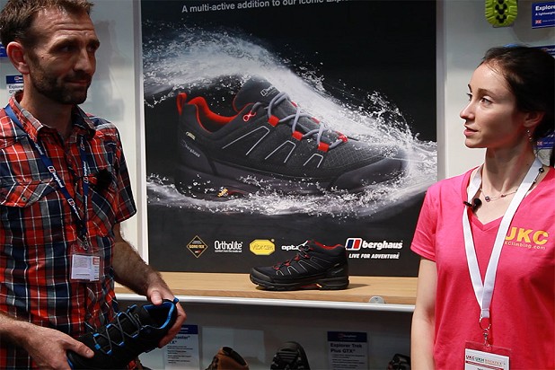 Chris Lines shows off some new shoes to Natalie Berry at the Berghaus stand  © Jack Geldard