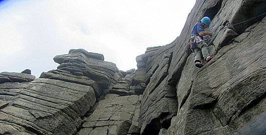 Gareth having fun - I think!
He is leading Manchester Buttress a  three star HS 4b route 16mts high..  © Mike Lee