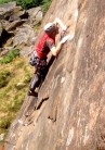 Contemplating the crux on Tower Face Direct