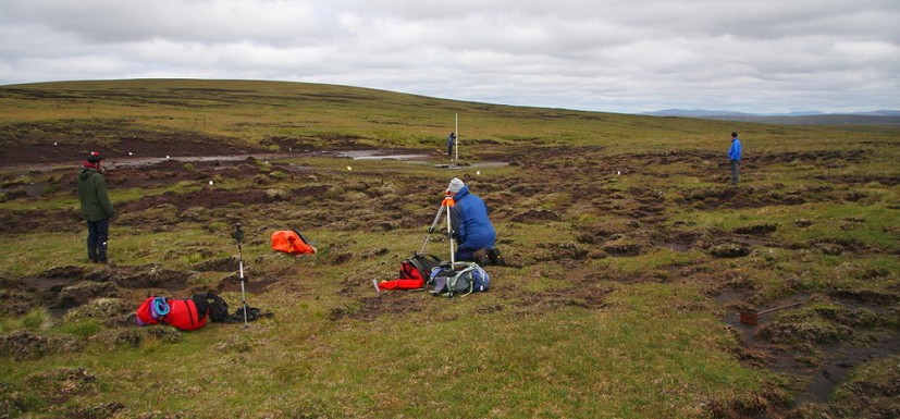 Immersed in a bog - surveying the bealach of Mullach Coire nan Cisteachan  © Myrddyn Phillips