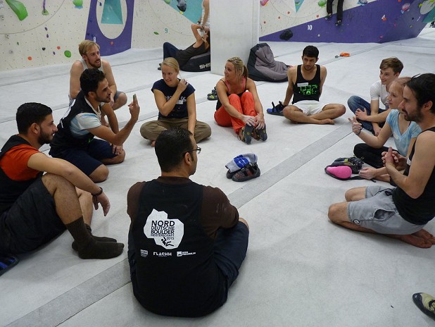 Some down time on the mats for mentors and refugees  © FLASHH Boulder Spot