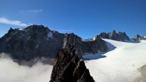 Guy Burton and Nick Buckman on a beautiful clear day above the Orny hut on Aguille d'Orny.