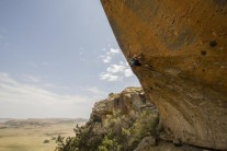 Katy Whittaker on a last day (sand storm) attempt of Deathcamp 8a+.