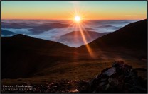 Sunset over a cloud inversion from Wandope in the Lake District.