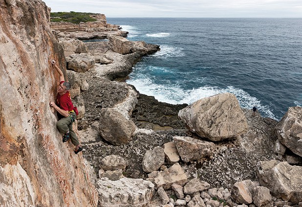 Alan James on the final couple of thin moves that are needed to finish Liaka (6a+) at Torre d'en Beu.  © Mark Glaister