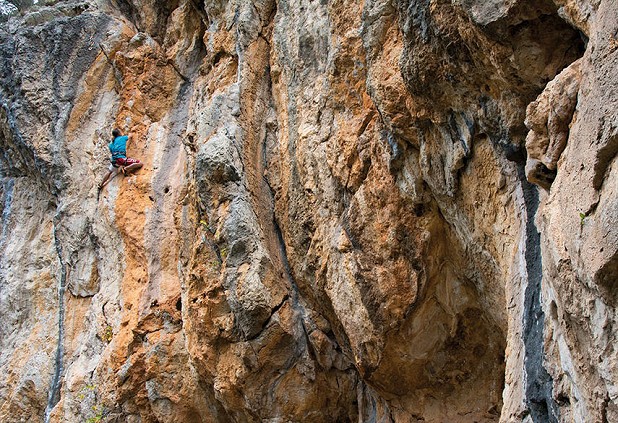 Paul Phillips eyeing up the final few metres of the pumpy climbing on Talaiot Corcat (6c) at Penyal d'es Grau  © Mark Glaister